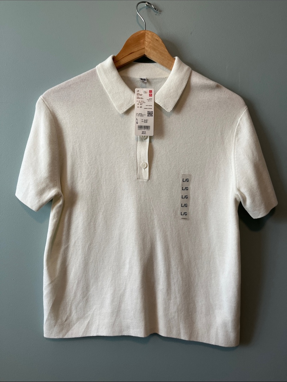 NWT UNIQLO KNIT POLO.    L
